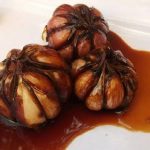 ترشی سیر (با رب انار و شیره انگور )